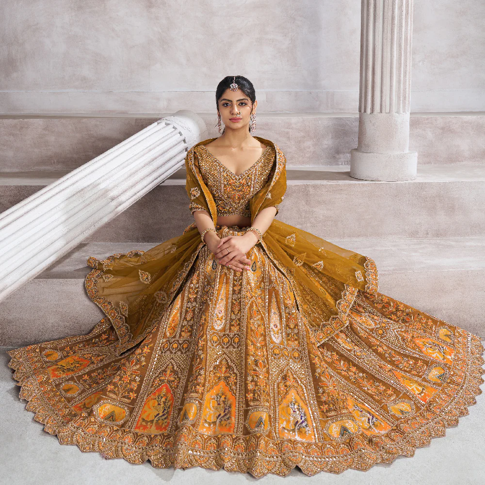 Earthy Mustard Color Bridal Lehenga with Patch and Aari Work Semi-Stitched Lehenga Choli Radiate Warm Elegance Earthy Mustard Color Bridal Lehenga with Patch and Aari Work Semi-Stitched Lehenga Choli - Image 1